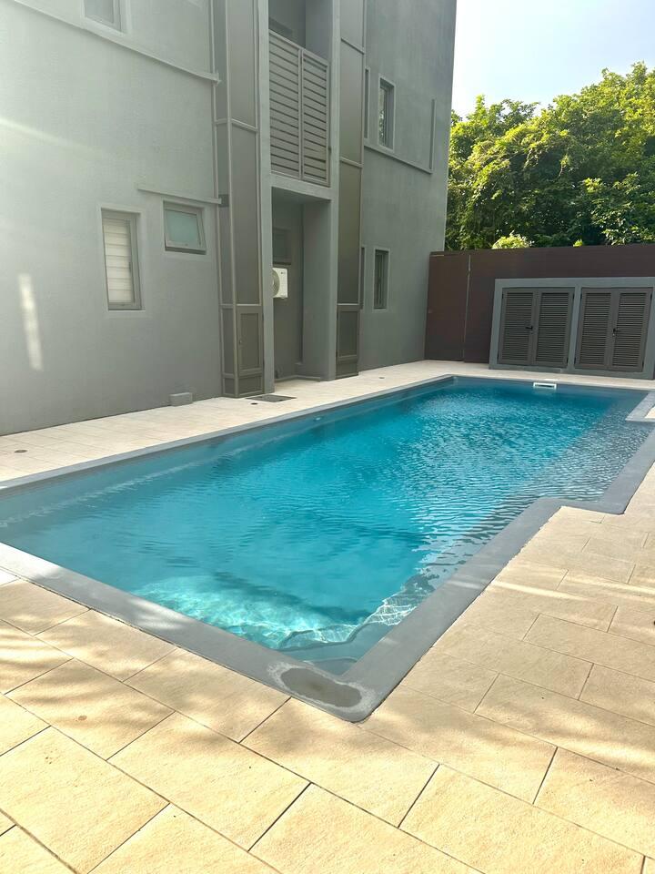 Stylish 3BR Apt •Pool• 2min Walk Pereybere Beach5